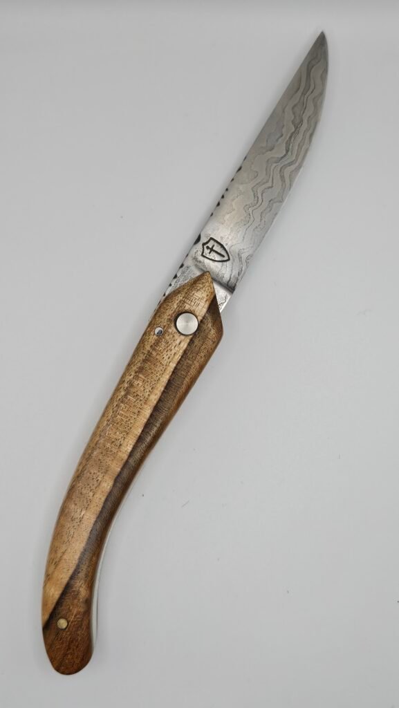 Couteau pliant à friction